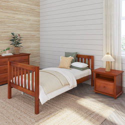 Cozy bedroom interior with wooden bed frame, nightstand, and dresser, featuring neutral tones and elegant decor.