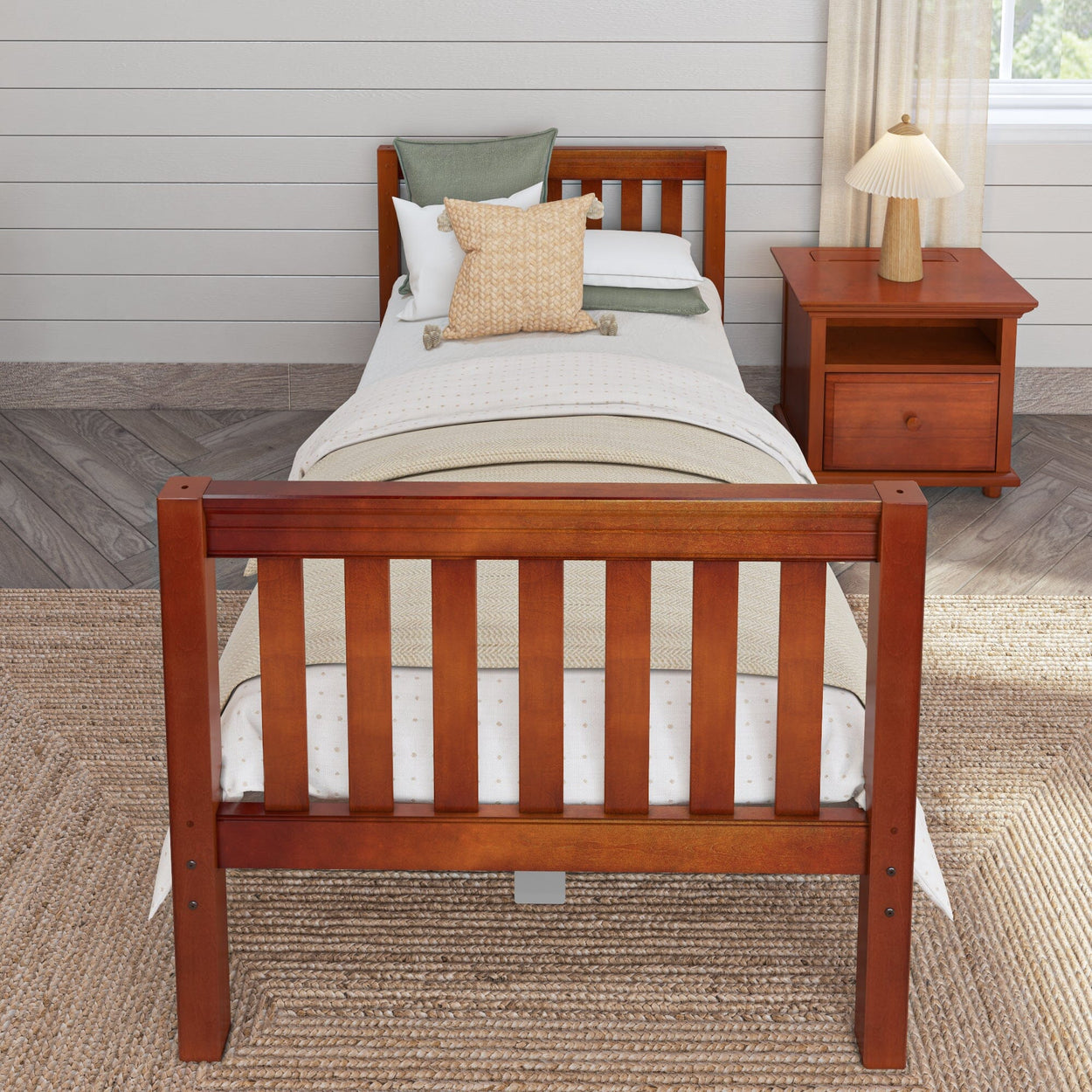 Solid wood bed frame with cozy bedding in a modern bedroom setting.