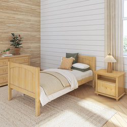 Wooden bedroom furniture set with single bed, nightstand, and dresser in a cozy room with neutral tones.