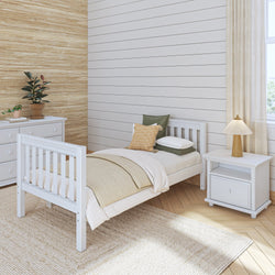 White modern children's bedroom with wooden single bed, matching nightstand, and cozy decor in natural colors.