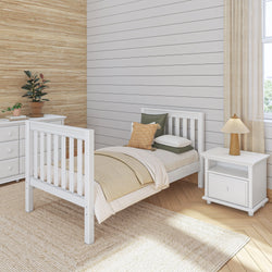 Cozy bedroom with white wooden bed, beige bedding, and rustic decor.