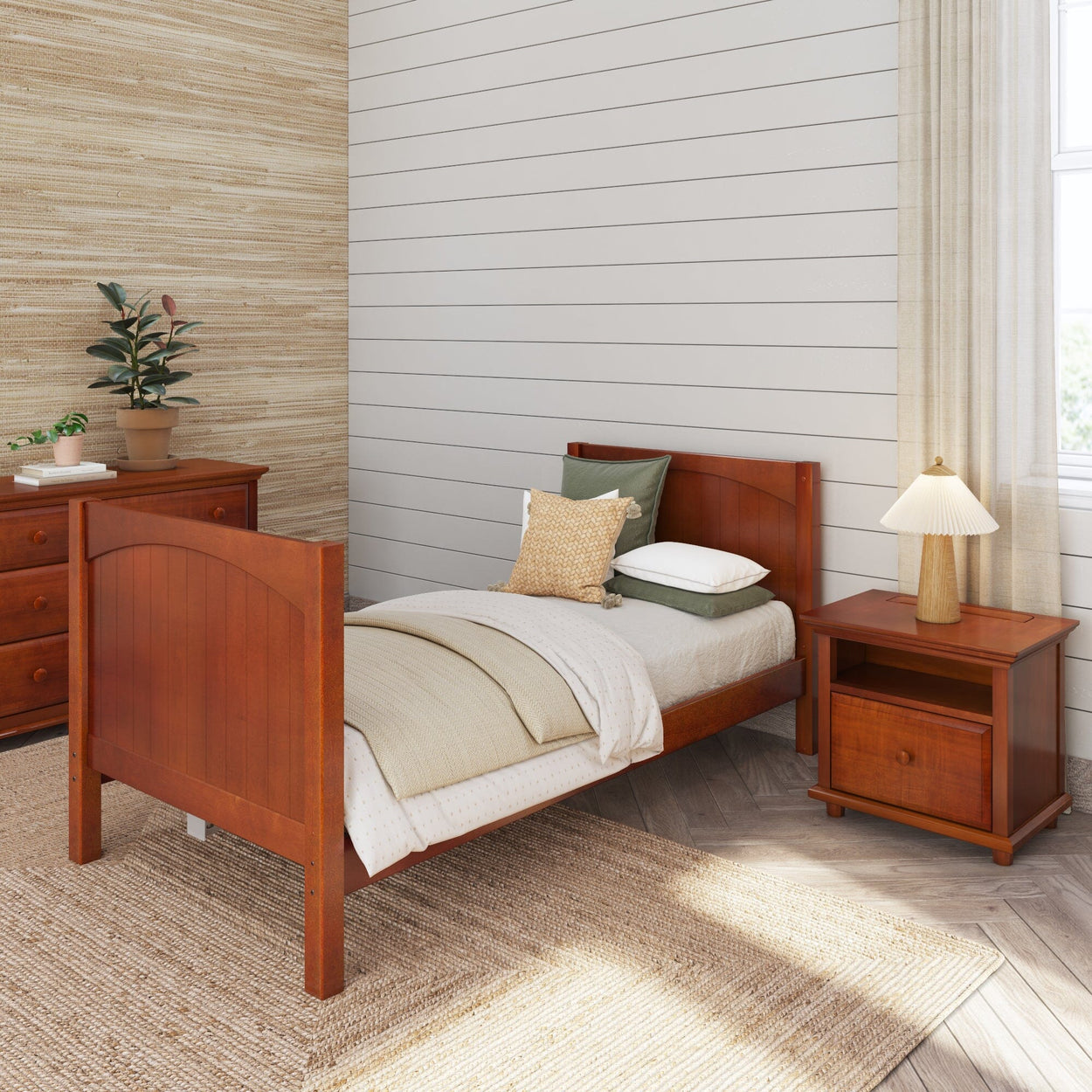Single wooden bed with beige bedding in a cozy, modern bedroom with wooden furniture and ambient lighting.