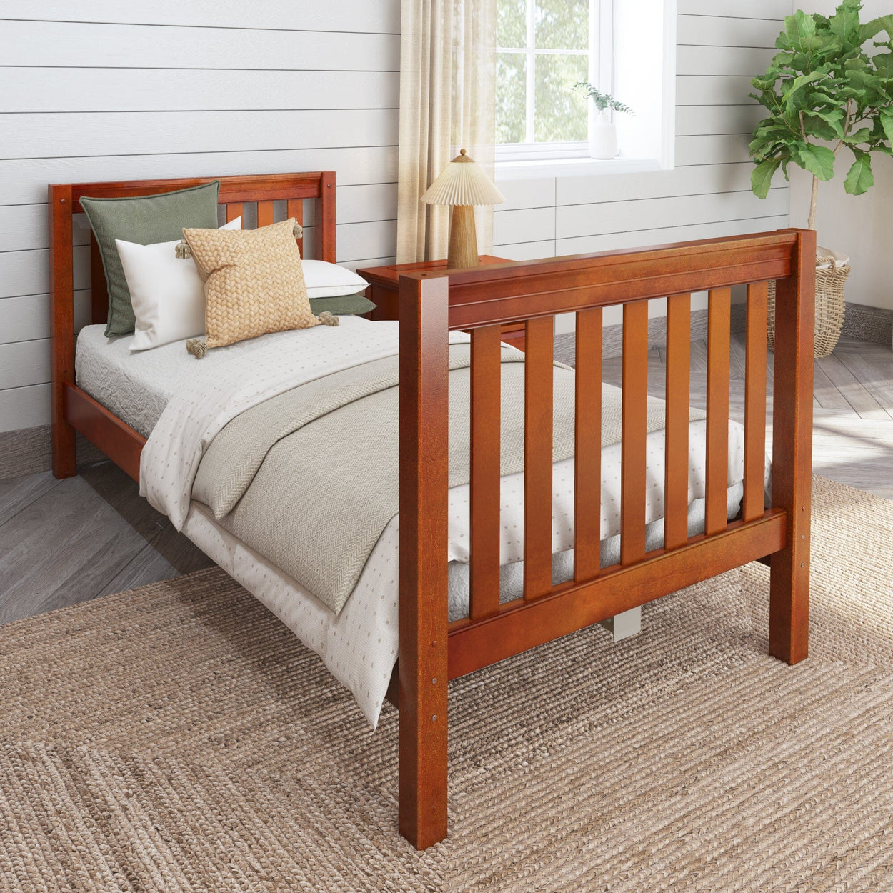 Wooden slat bed frame in cozy bedroom with beige bedding and decorative pillows.