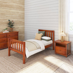 Wooden twin bed in a cozy bedroom with matching dresser and nightstand, featuring neutral decor and natural light.