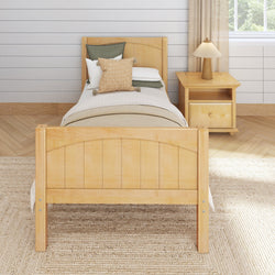 Wooden twin bed with cozy bedding and nightstand in bright, minimalist bedroom.