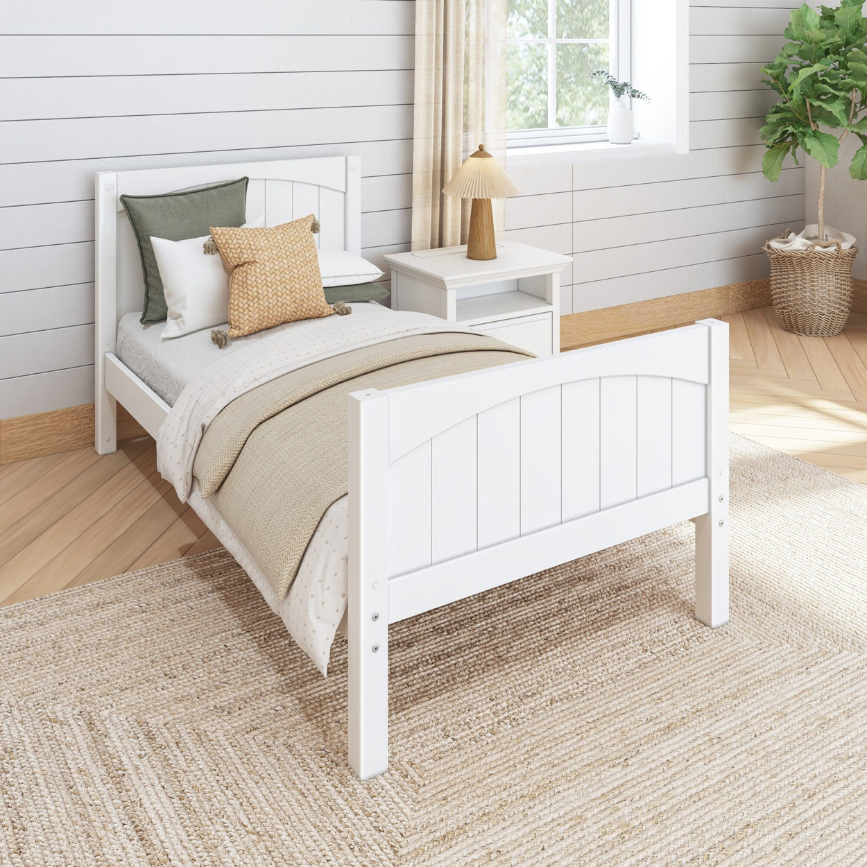 White wooden bed frame in a cozy, modern bedroom with neutral decor and natural light.