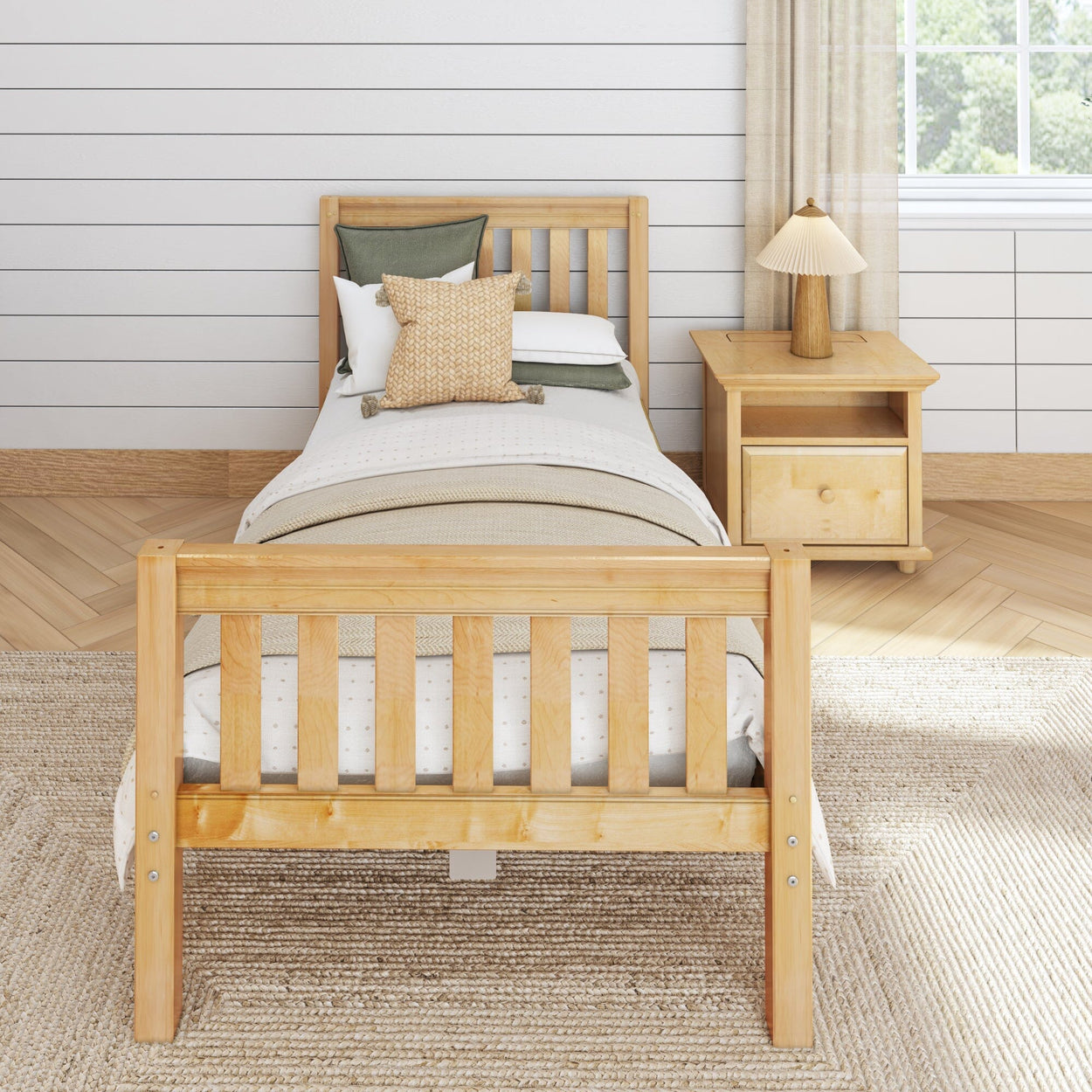 Single wooden bed frame with green and beige bedding in a cozy bedroom setting.