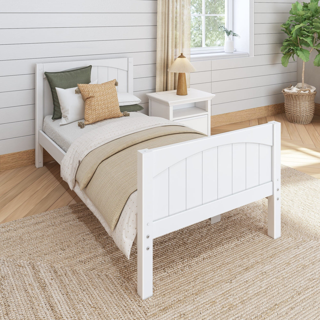 Cozy bedroom interior with a white wooden bed frame, neutral bedding, and decorative pillows, next to a nightstand and woven rug.