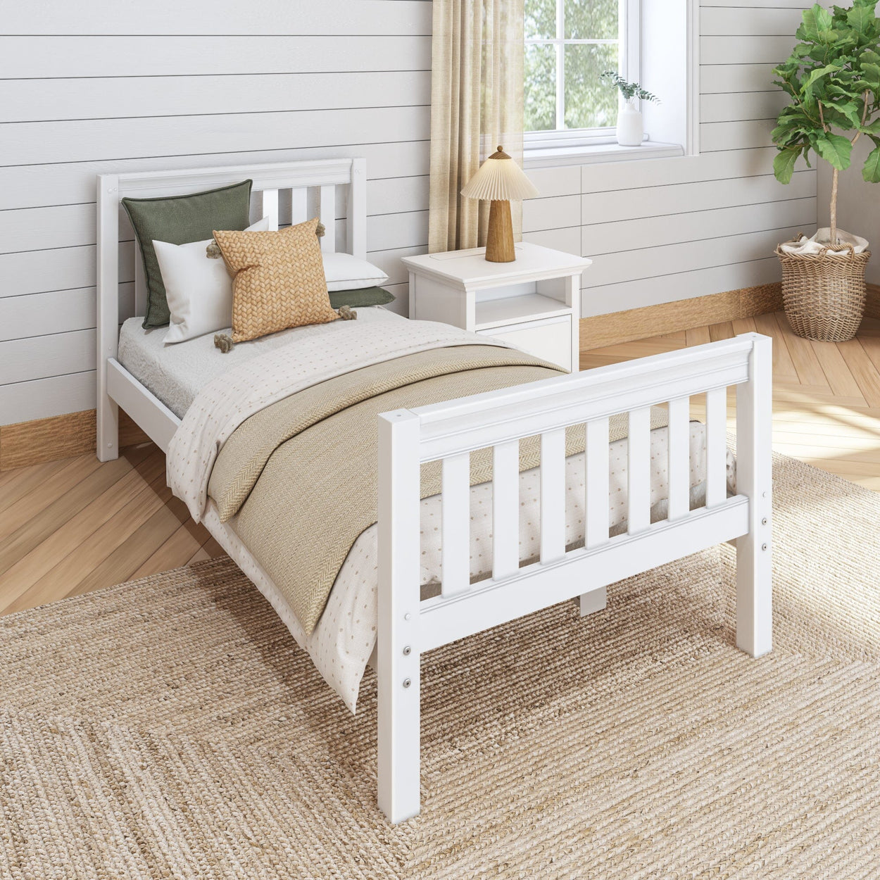 White wooden bed frame in a cozy bedroom with neutral bedding, a nightstand with a lamp, and rustic decor elements.