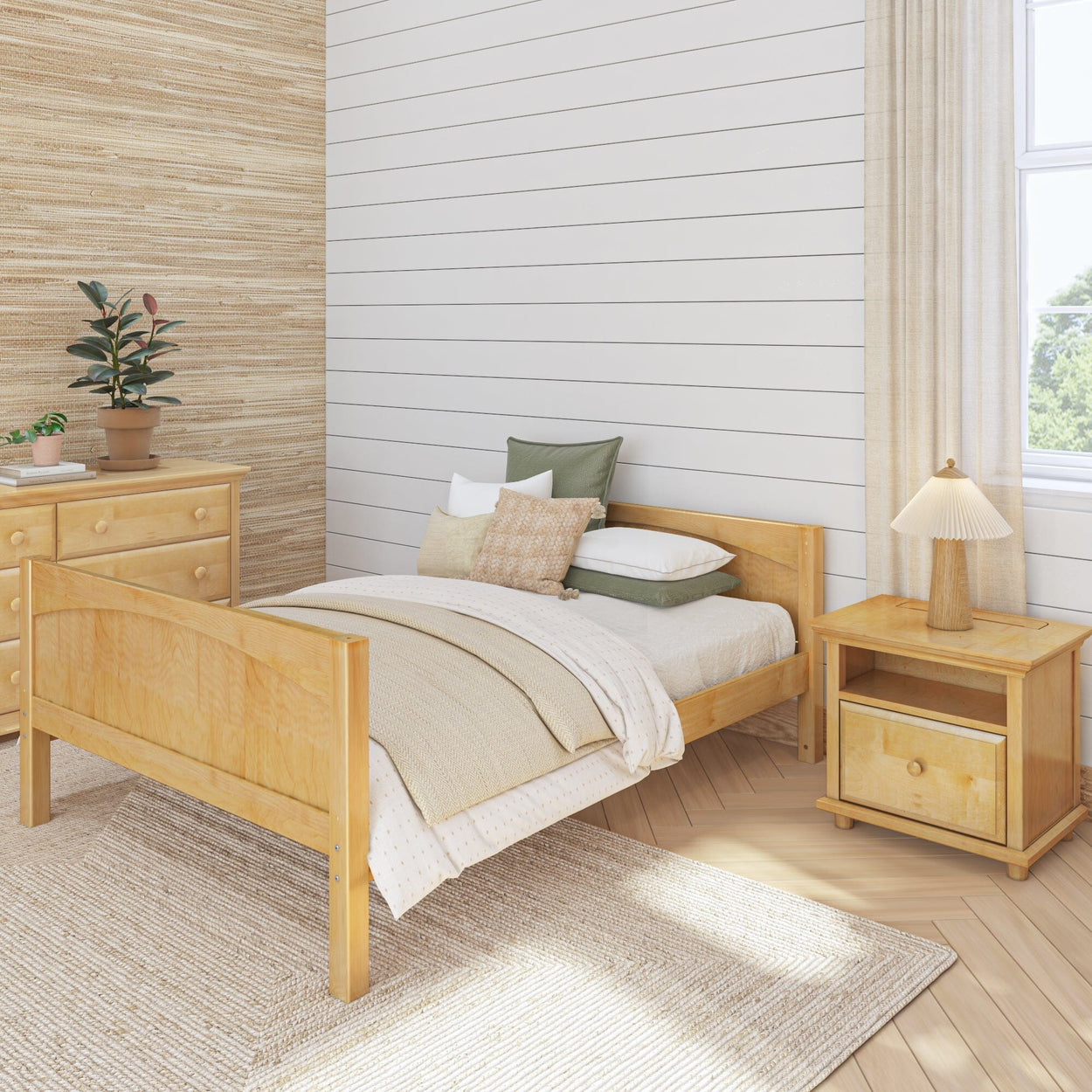 Cozy bedroom with wooden bed, nightstand, and natural decor elements.