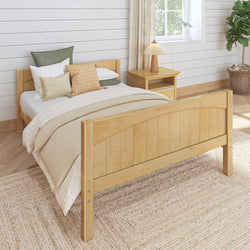 Wooden bed frame in a cozy, modern bedroom with natural light and neutral decor.