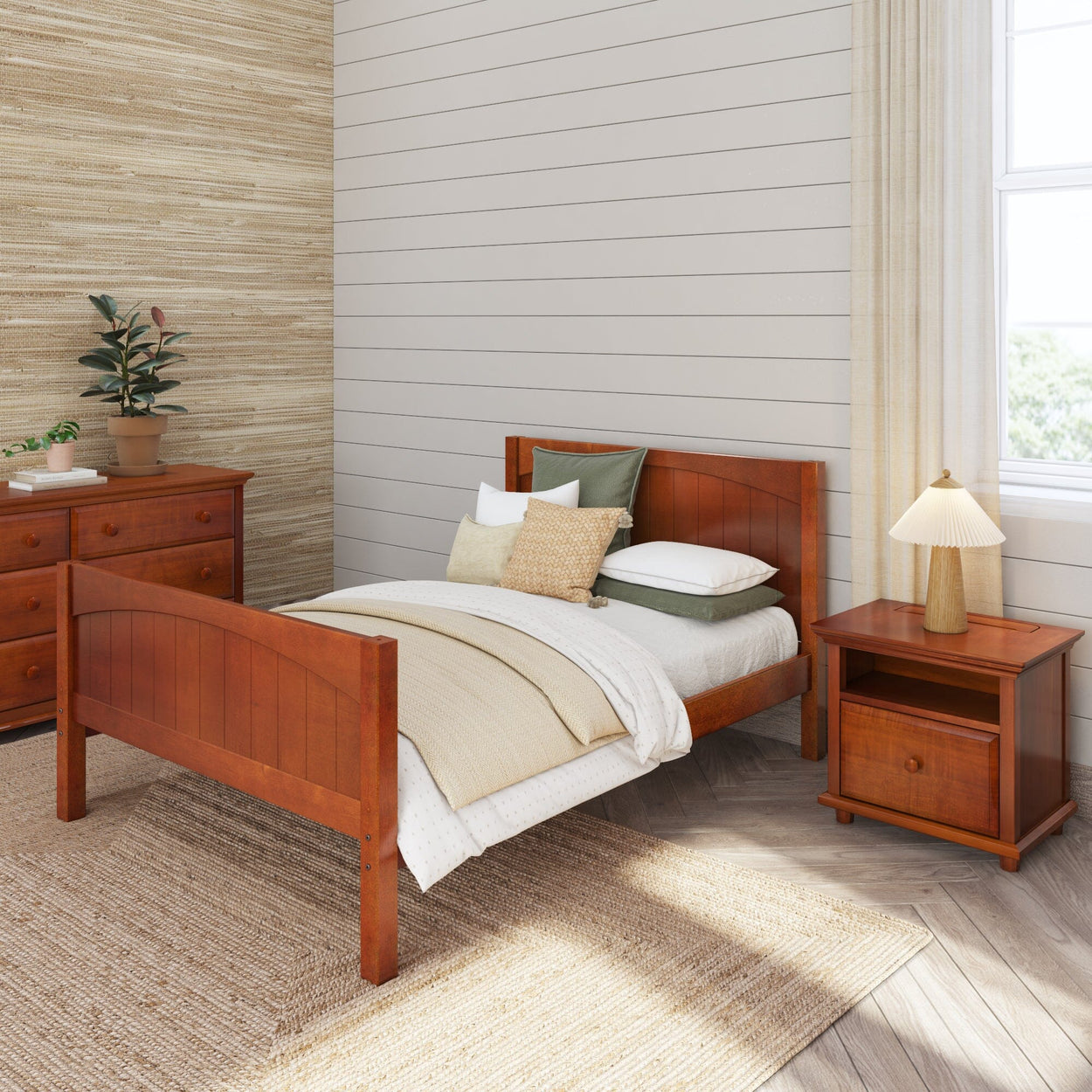 Wooden bedroom furniture set with bed, nightstand, and dresser in a cozy, natural-toned room.