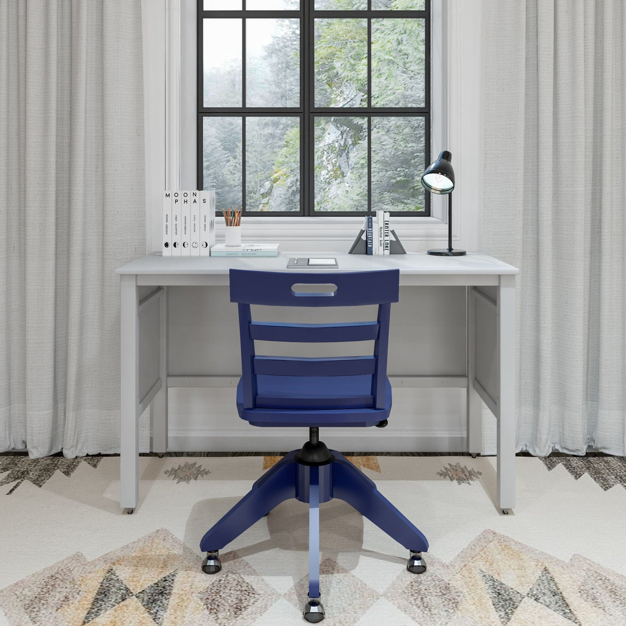 Office desk setup with a blue chair in a bright room, featuring a window view and modern decor.