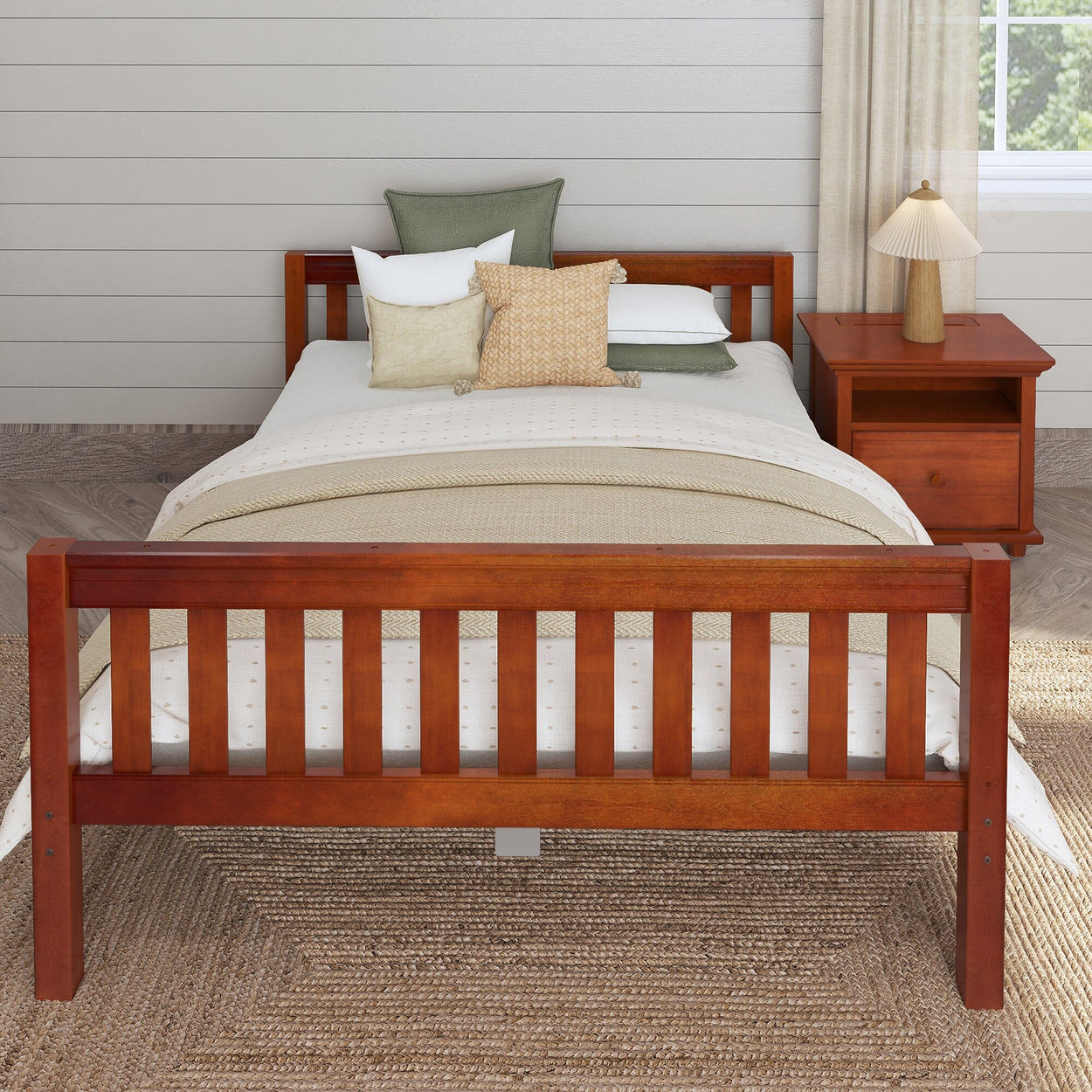Wooden bed frame with beige bedding and pillows in a cozy bedroom setting.
