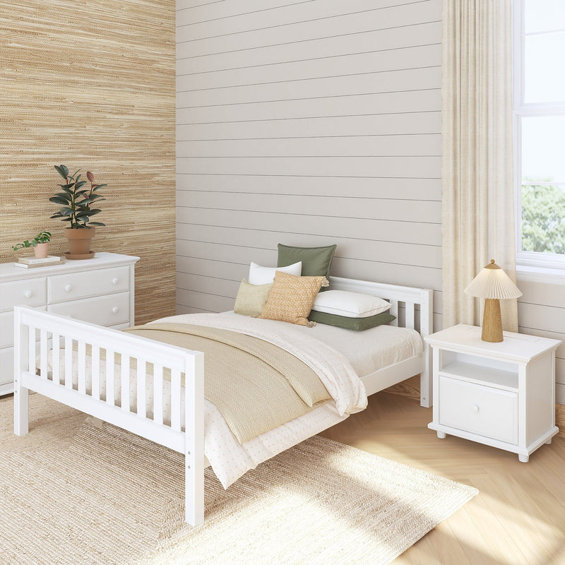 Neutral nursery bedroom with white wooden bed, beige shiplap and textured grasscloth walls, natural bedding and pillows, potted plants and window light
