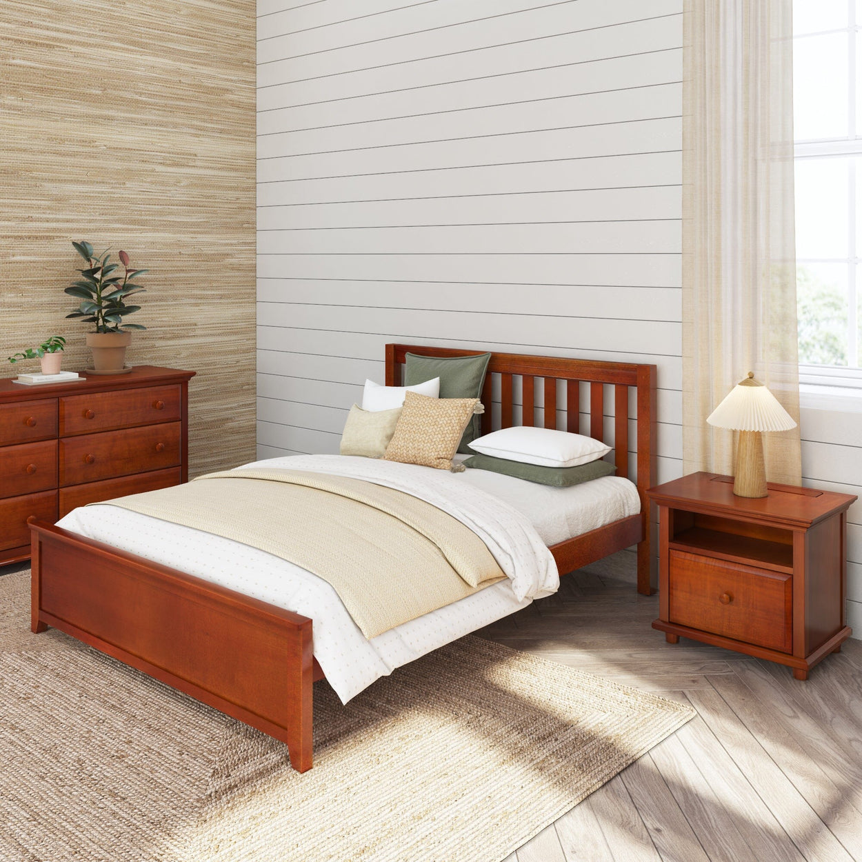 Contemporary bedroom with wooden bed frame, dresser, and nightstand, featuring neutral bedding and decorative pillows.