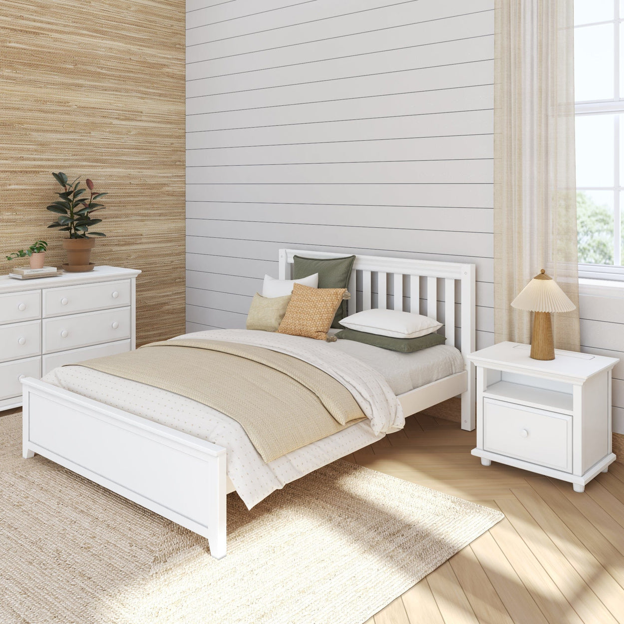 Cozy modern bedroom with white furniture, beige bedding, side table, and natural decor elements.