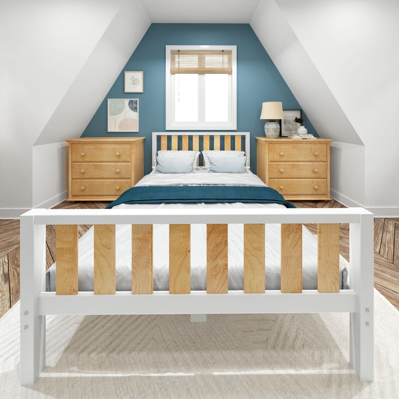 Cozy attic bedroom with sloped ceilings and blue accent wall, white wooden bed with natural wood slats, matching pine nightstands, bedside lamp and minimalist artwork