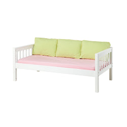 White wooden daybed with green back cushions and pink mattress.