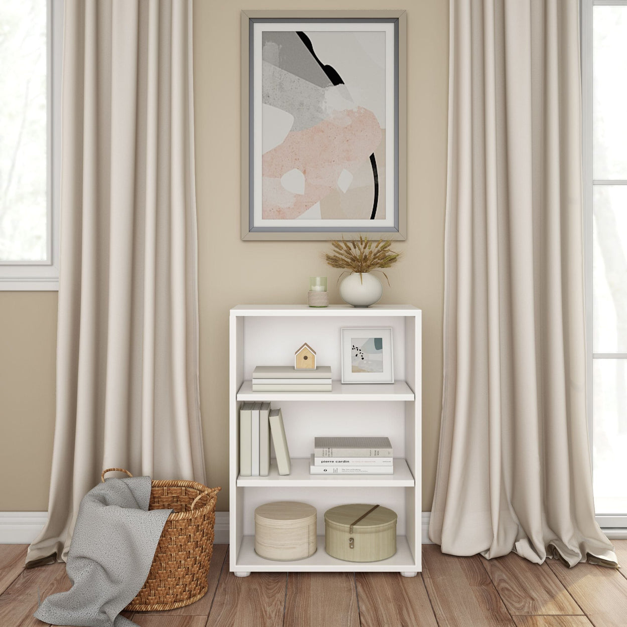 Modern minimalist living room with white bookshelf, contemporary artwork, and decorative items for interior design inspiration.