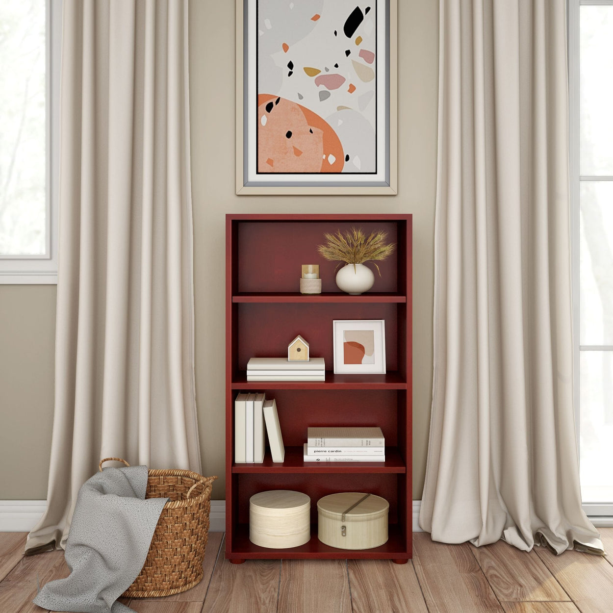 Elegant living room corner with a red wooden bookshelf, abstract wall art, and cozy decor items.