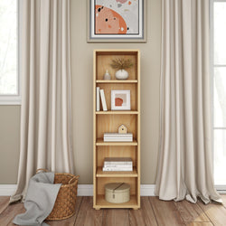 Modern wooden bookshelf in a cozy living room with beige curtains and decorative items.