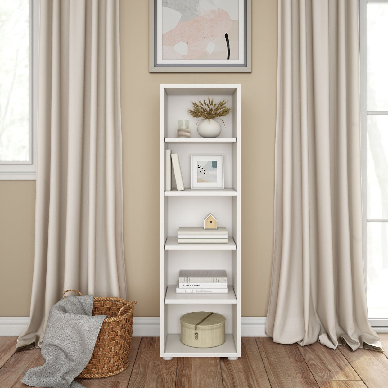 Tall white bookshelf with books and decor in a modern living room interior.