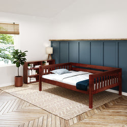 Stylish wooden daybed in a modern bedroom with blue accent wall and cozy decor.
