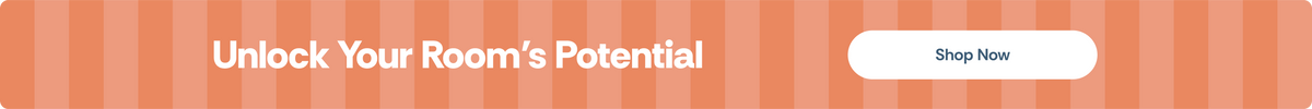 A promotional banner with vertical pink and orange stripes, featuring the text 'Unlock Your Room's Potential' in white on the left and a white 'Shop Now' button on the right.