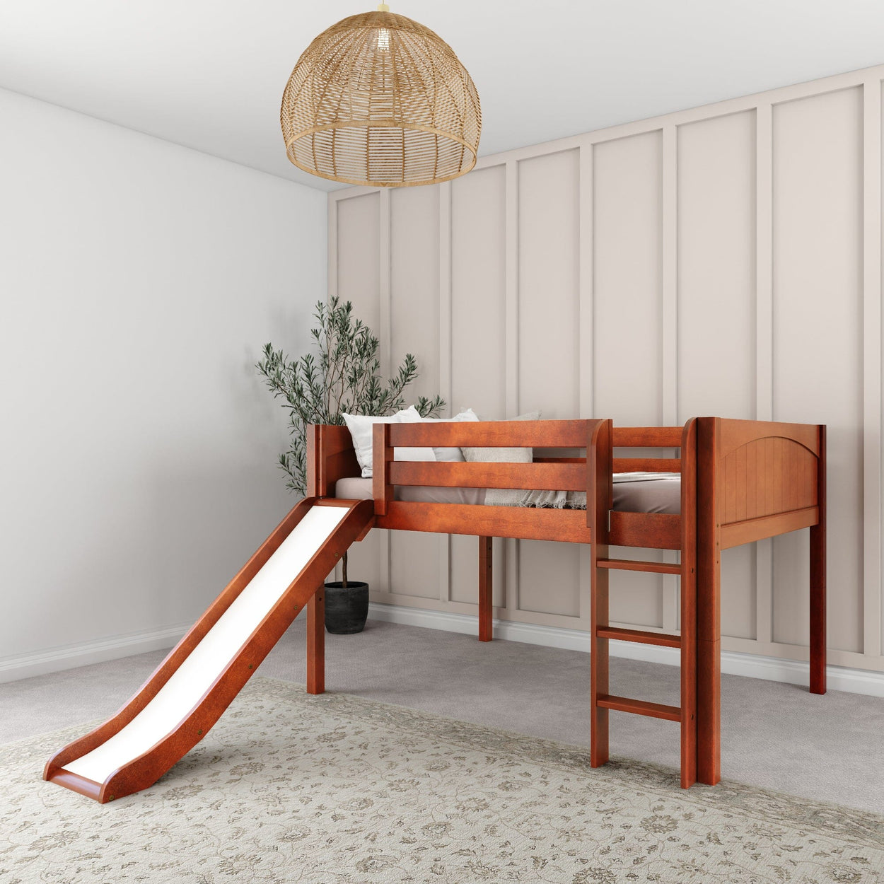 Wooden loft bed with slide in modern bedroom setup, featuring ladder and stylish wall decor.
