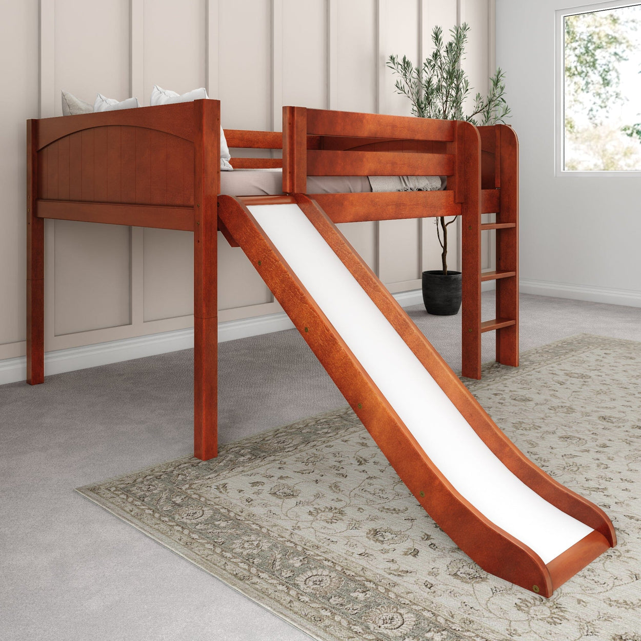 Children's wooden loft bed with slide and ladder in modern bedroom.