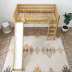Kids wooden loft bed with slide, ladder, and safety rails in cozy bedroom setting with decorative rug.