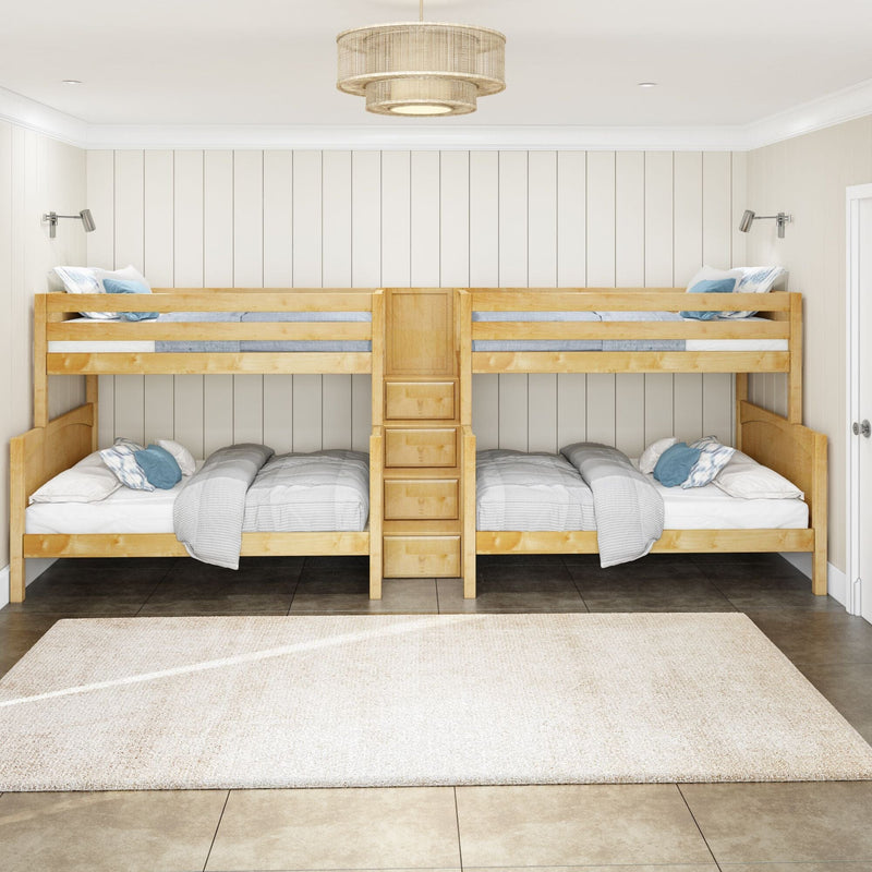 Natural wood twin-over-full bunk beds with built-in drawer ladder, gray bedding and blue accent pillows, wall-mounted reading lights and modern drum pendant on white vertical shiplap wall in a coastal-style kids' bedroom with neutral rug
