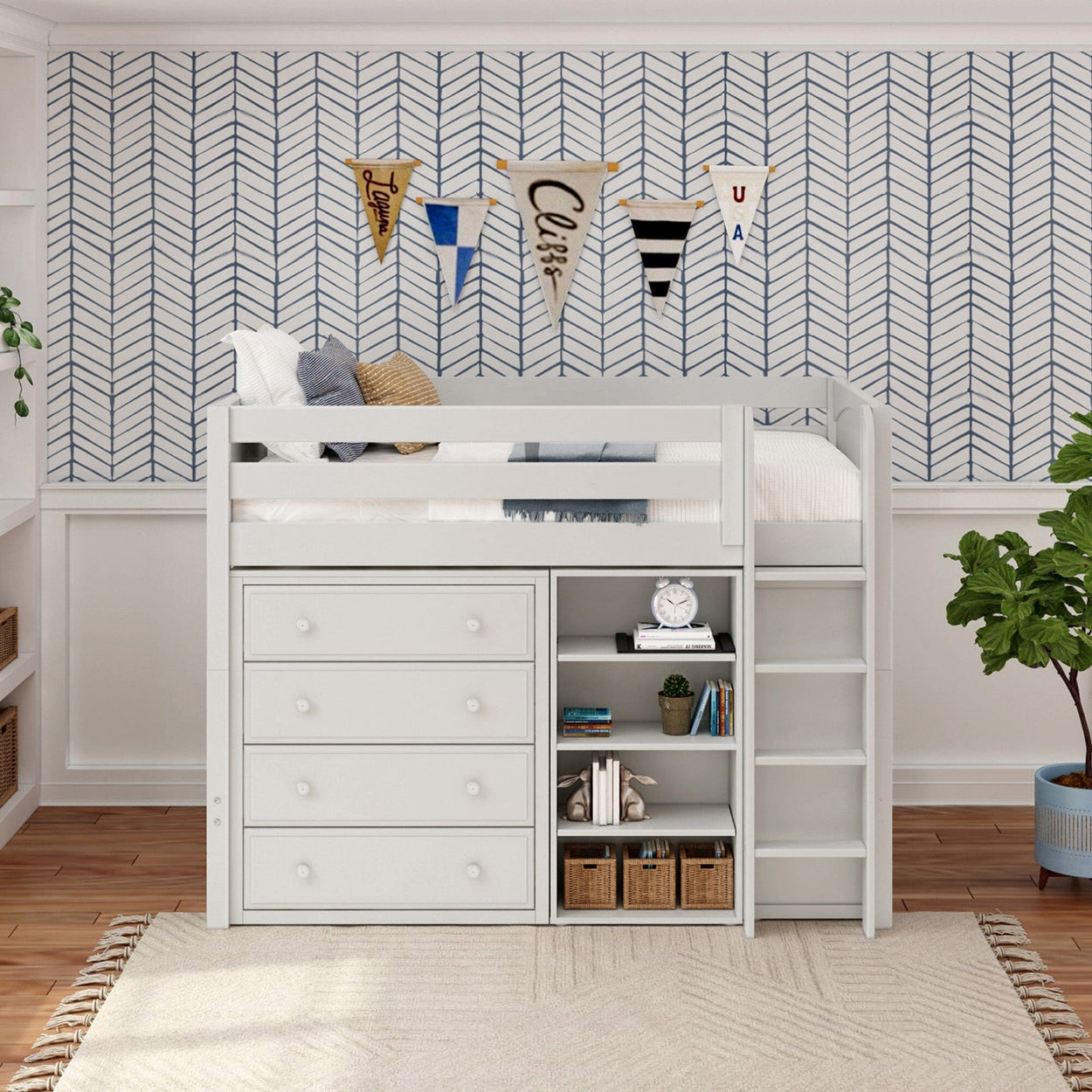 White loft bed with built-in drawers and shelves in a modern kids' room with chevron wallpaper and decorative flags.
