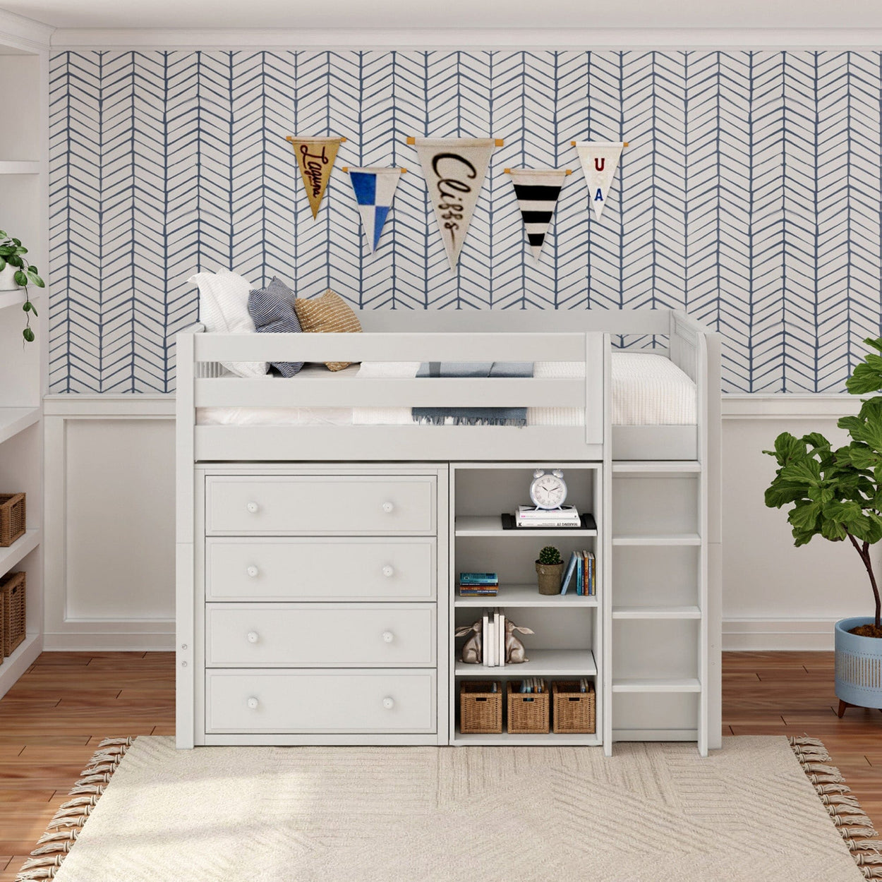White loft bed with integrated drawers and shelves in a modern kids' room with chevron wallpaper and decorative buntings.