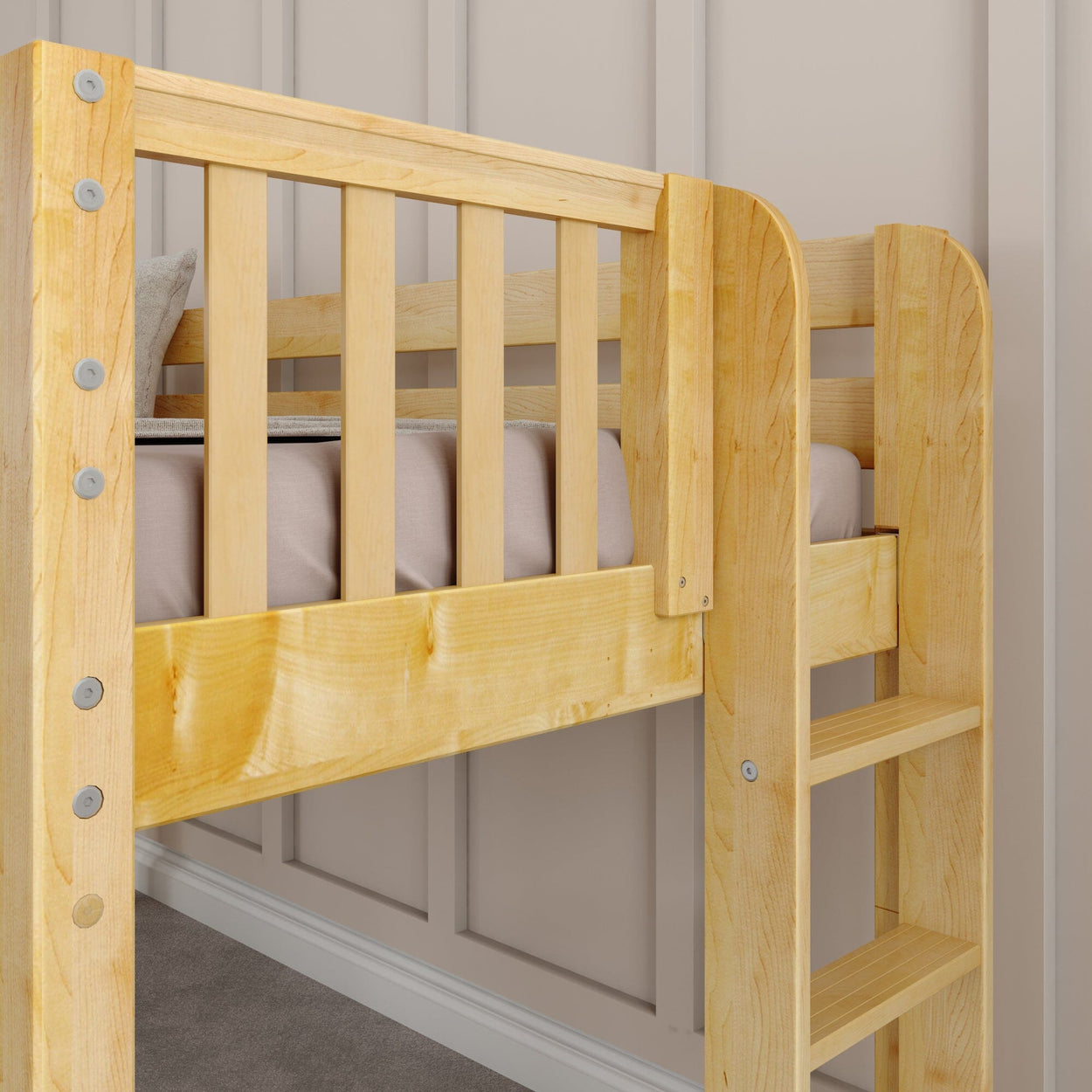 Wooden bunk bed with ladder and beige wall panel background.