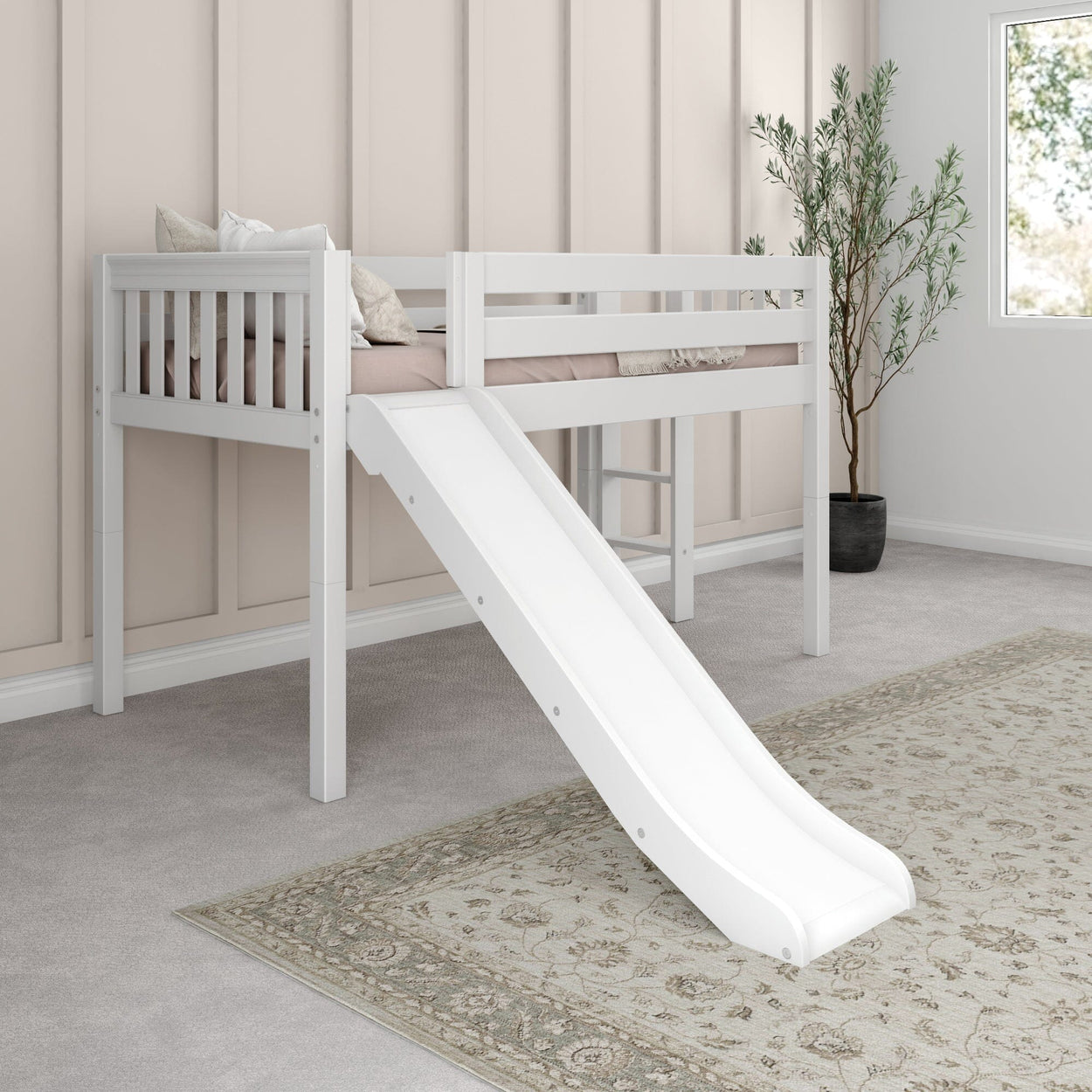 White wooden loft bed with slide and beige bedding in a cozy children's room with light decor and a potted plant.