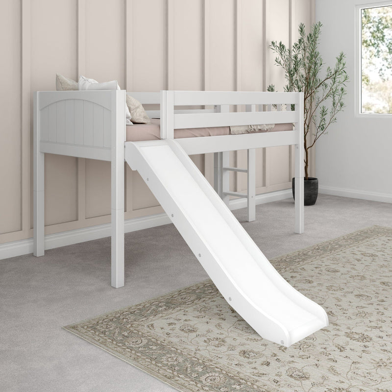 White loft bed with slide in neutral kids bedroom, space-saving children's loft bunk with pillows, beige paneled wall, potted plant and window light