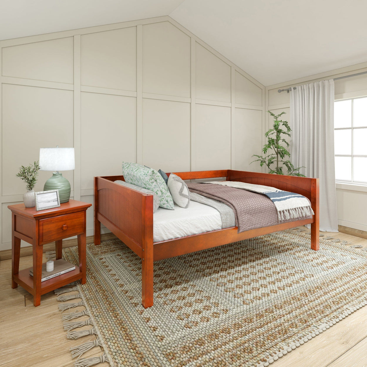 Stylish wooden daybed in a modern bedroom with a cozy textured rug and elegant nightstand.