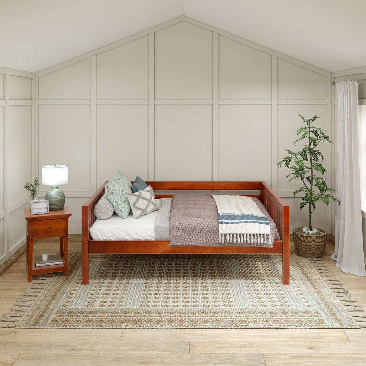 Stylish wooden daybed with cozy cushions and decorative throw in modern bedroom setting.