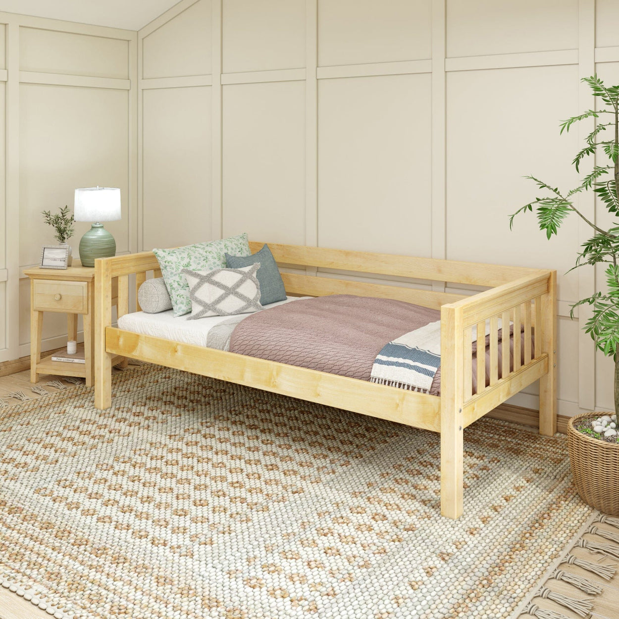 Wooden daybed with cushions in cozy bedroom setting.