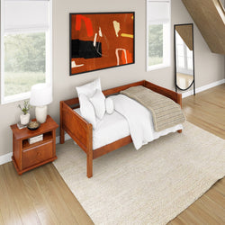 Modern bedroom with wooden bed frame, neutral bedding, and abstract wall art in bright, minimalist space.