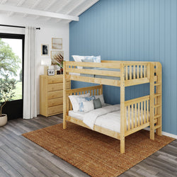Wooden bunk bed in a modern bedroom with blue accent wall, natural light, and cozy decor.