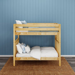 Wooden bunk bed with white bedding in a room with blue walls and a woven rug.