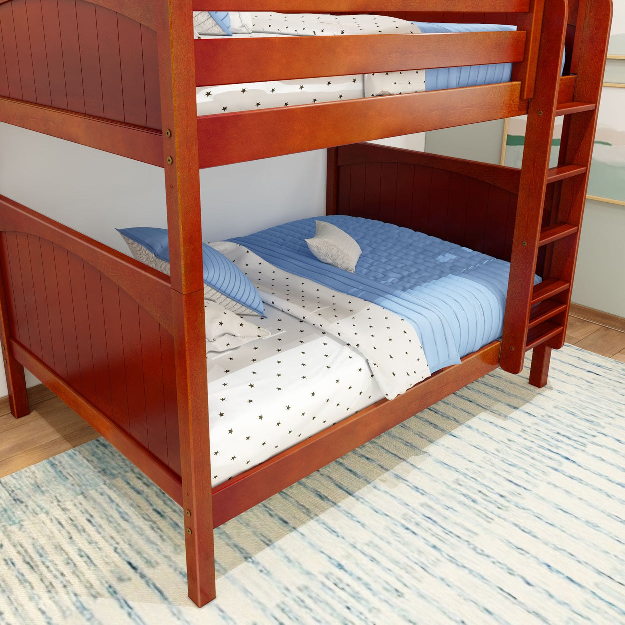 Red wooden bunk bed with blue and white bedding in a cozy bedroom setting.