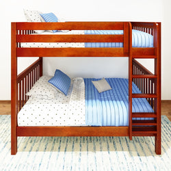 Wooden bunk bed with blue and white bedding in a modern bedroom.