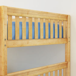 Wooden bunk bed with blue mattress in a minimalistic room.
