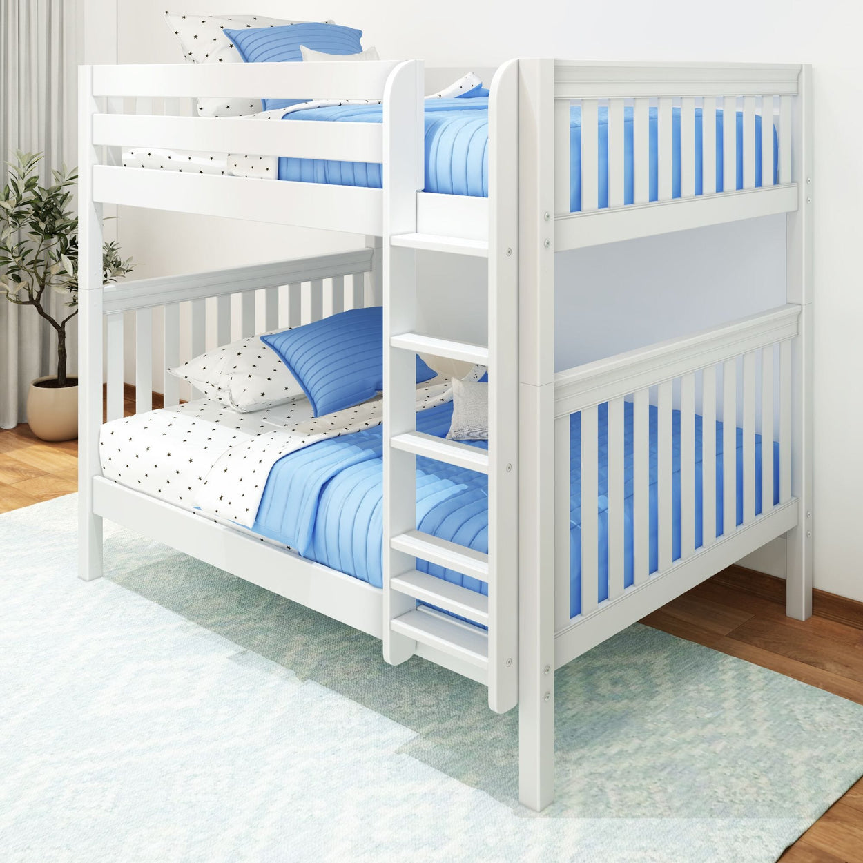 White bunk bed with blue and polka dot bedding in a modern bedroom setting.