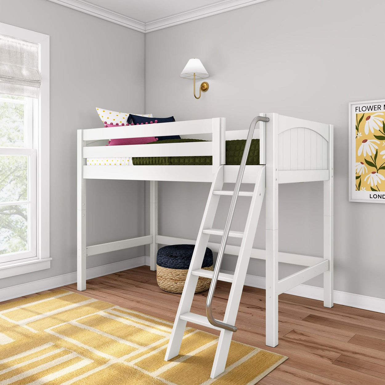 White twin loft bed with ladder and metal handrail in kids' bedroom — space-saving wooden children's loft bed with guardrail, colorful pillows, yellow rug and wall sconce