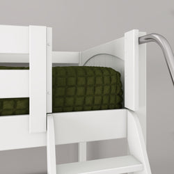 White wooden bunk bed close-up with integrated ladder and metal handrail, olive-green quilted blanket on top mattress — modern kids loft bed